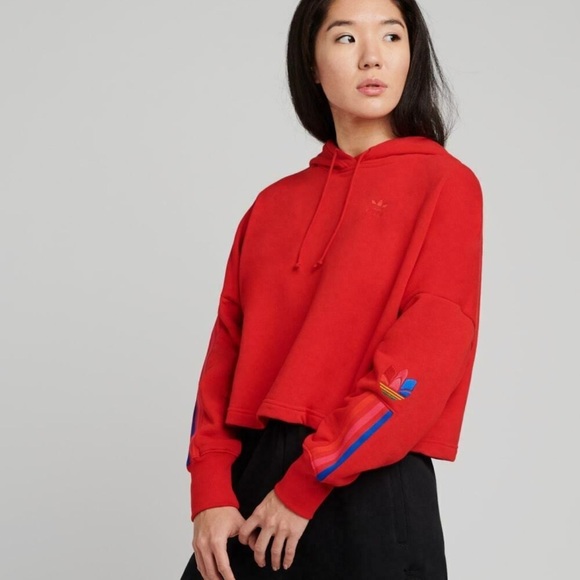 adidas Sweaters - adidas Red Cropped Hoodie with Multicolor Trefoil Sleeve Accent